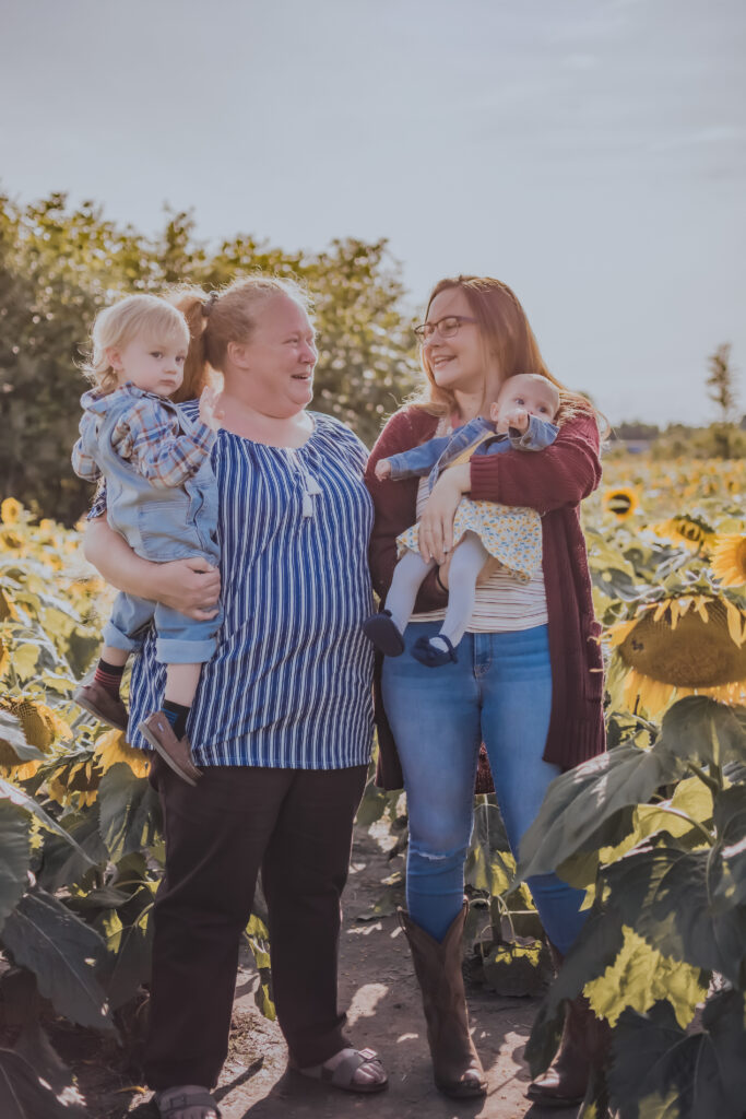 family photos in sunflower field